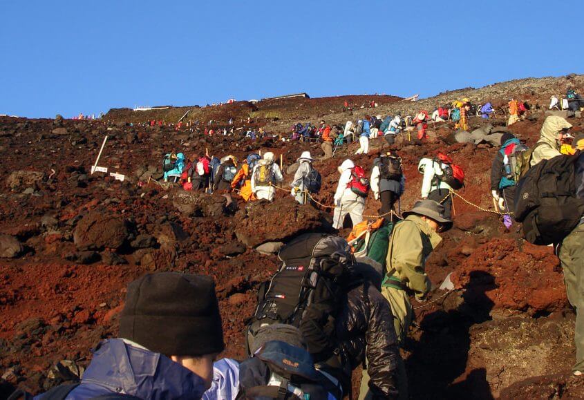 Line of climbers ascending Mt. Fuji