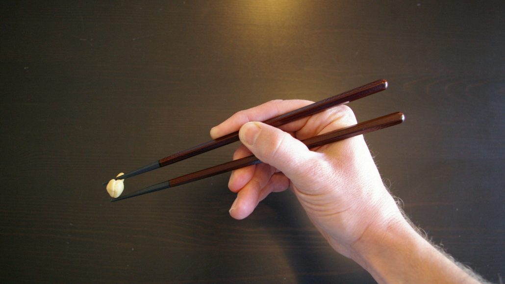 Base Chopstick on Middle Finger