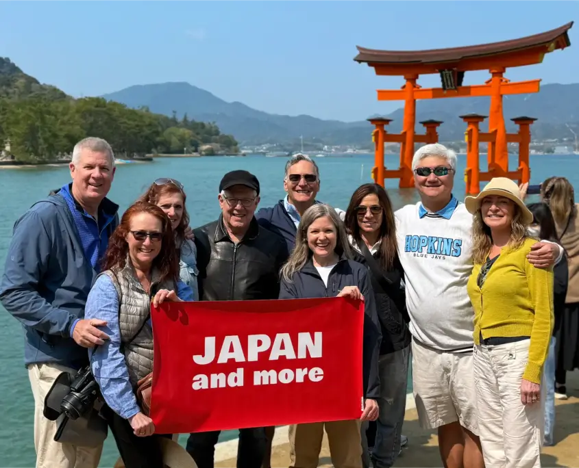 Tour Guests at the Floating Torii Gate on Miyajima Island - 2025 Japan Small Group Tours