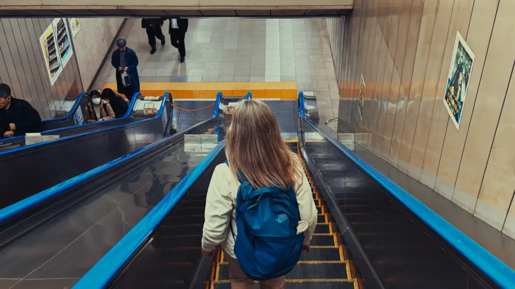 Bex on Escalator to NEX Platform at Tokyo Station