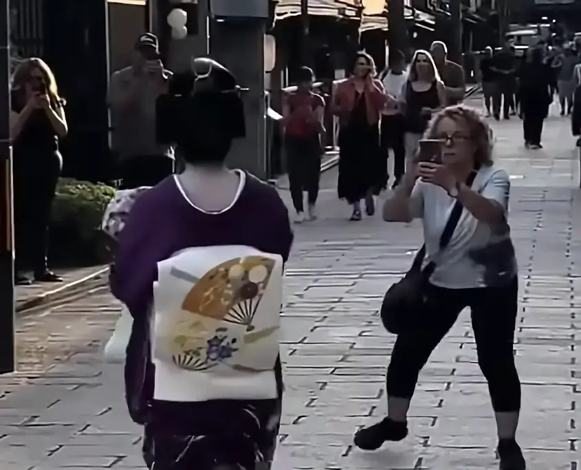 Tourist Blocking a Geiko for a Photo